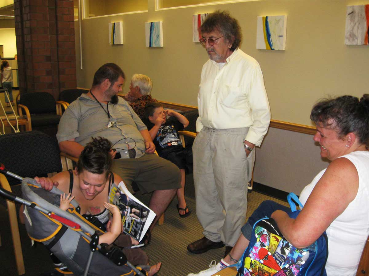 Dr. Robert Colonna at the Community Lead Health project with families and children